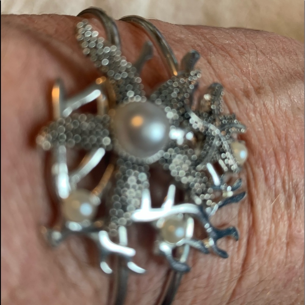 Silver starfish bracelet, worn once